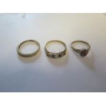 Three 9ct yellow gold rings sizes K and Q - approx weight 5.2 grams