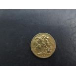 A Victorian gold full sovereign coin dated 1889
