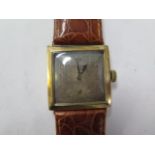 A 9ct yellow gold manual wind gents wristwatch - 26mm case - running, hands adjust - total weight