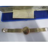 A 9ct yellow gold Tissot manual wind bracelet wristwatch with a 32mm case - Length 20.5cm - total