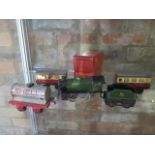 A Hornby O Gauge clockwork train set - Loco running with key, coaches have boxes