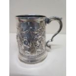 An embossed silver tankard London 1790/91 - Height 9cm, approx weight 5 troy oz - repaired split