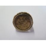 An Edward VII gold sovereign dated 1910? in a 9ct gold ring mount - total weight approx 17.5 grams -