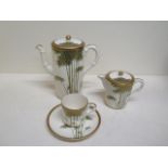 A Satsuma coffee pot - 17cm tall - a lidded milk jug and a coffee can and saucer - minute chip to