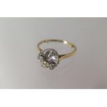 A stunning diamond solitaire ring - 2.87ct, round brilliant cut, colour K, clarity VVS2 - mounted in