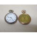 A silver top wind pocket watch - running and a top wind gold plated Waltham pocket watch, not