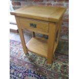 An oak lamp table with a drawer - Height 78cm x 60cm x 44cm