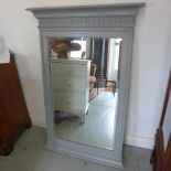An early 20th century wall mirror painted in Farrow & Ball Plummett colour with bevelled edge