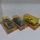 Three Dinky 1:25 scale Ford Capris nos 2162, 2253, 2214 - all boxed, some plastic cover damage