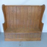 A good 19th century pine settle with lift up seat for storage - Height 138cm x Width 146cm x Depth