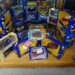 A collection of 26 diecast boxed Corgi Minis and an AHC models mini