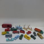 17 unboxed Dinky Toys vehicles - some play wear but no repaints and two Esso pumps