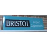 An enamel Bristol Tipped Cigarette advertising shop sign 43cm x 152cm - some small chips but