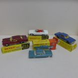 Four boxed Dinky toys American cars - Plymouth Fury Sports 115, Pontiac Parisienne 173, Ford Mercury