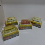 Four Dinky boxed Bedford vans 410 - plastic covers worn/split otherwise generally good