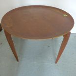 A folding teak coffee table for Fritz Hansen Denmark - Height 43cm x Diameter 60cm some stains to
