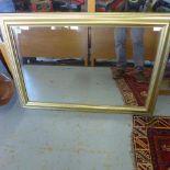 A modern mirror with bevelled edged glass - Height 70cm x 100cm