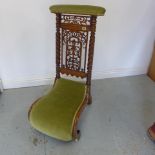 A pretty Victorian walnut fretwork prie dieu chair - Height 100cm
