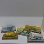 Dinky Toys - 4 boxed boats - Air Sea Rescue Launch 678 - cover broken - Motor patrol boat 675, O.S.A