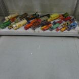 A collection of approx 30 Dinky toys and other diecast vehicles - all playworn