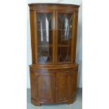 A Georgian style mahogany bowfronted corner cupboard - Height 180cm x Width 92cm - in good condition