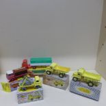 Five Dinky Toys all boxed AEC articulated lorry 914, Bedford Coca Cola truck 402, 2 x Euclid rear