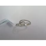 A 9ct white gold flow ring size N - approx weight 1.8 grams - 1 stone missing - ex jewellers stock -