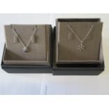 A Clogau silver snowflake pendant and a Clogau silver cornflower pendant - ex jewellers stock - as