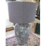 A large good quality table lamp and shade