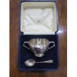 A Mappin and Webb twin handle silver dish and spoon boxed - London 1924/25 - approx weight 7.2