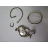 A hallmarked silver charm bracelet, another bracelet, bangle and ring all marked 925 - total