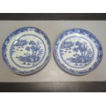 A pair of Chinese blue and white dishes possibly 19th century - Diameter 25.5cm - hairline cracks to