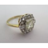 An Art Deco Style 18ct Yellow Gold, 2ct Asscher Cut Diamond Ring, Surrounded By 2 Baguettes and 12