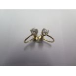 A pair of diamond 9ct yellow gold screw back earrings - diamond weight approx 0.35ct - diamonds