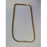 A 9ct yellow gold 46cm chain approx weight 16.9 grams - generally good, catch good