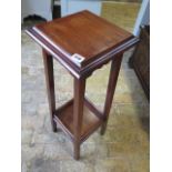 A circa 1900's walnut two tier jardiniere/plant stand - Height 82cm x 28cm x 28cm - in polished