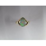 A 14ct yellow gold opal ring size L/M - approx weight 3.1 grams