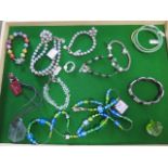 An assortment of costume jewellery to include bracelets/pendant/ring - ex jewellers stock - as new