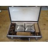 A vintage motoring/travel picnic hamper with a leather effect hard case, fitted interior with two