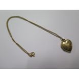 A 9ct yellow gold chain - Length 40cm - with a 9ct plated back and front heart locket - total weight