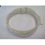 A rigid 6 strand pearl choker sprung - ex jewellers stock - as new condition - RRP £106.50