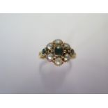 A Victorian 18ct emerald and split pearl cluster ring, fully engraved shank and scroll shoulders