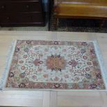A Tabriz rug in multi pastel colours - 100cm x 60cm