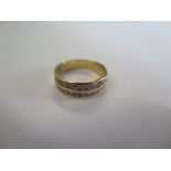 A 14ct yellow gold diamond two band ring approx weight 0.73ct - ring size M/N - approx weight 4.5