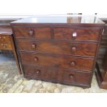 A Georgian/early Victorian ebony strung and crossbanded chest of two over three drawers with bun