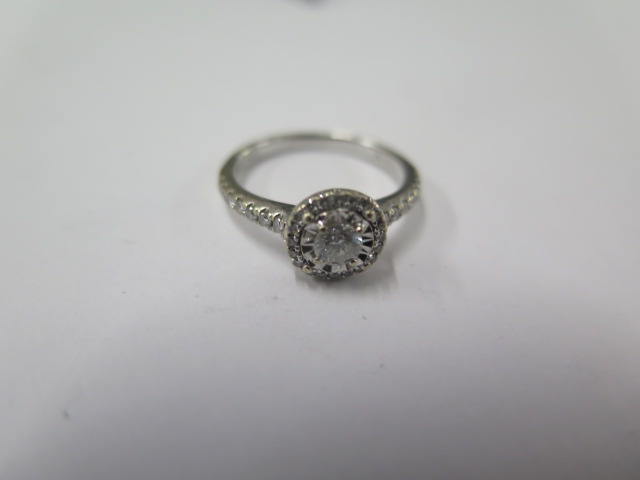 A 9ct white gold diamond halo cluster ring with Beaverbrooks Diamond Certificate for the center - Image 2 of 3