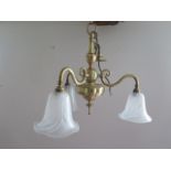 A brass three branch ceiling light with bell shaped glass shades - Width 53cm