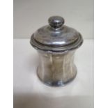 A silver tea caddy London 1908/09 - Height 12cm - engraved to top, dent to top, small dent to side
