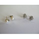 A pair of white metal diamond snowflake earrings - 10mm wide, approx total weight 2 grams - and a