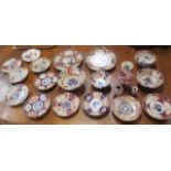 A large collection of Imari ware including vases, bowls and plates - 20 pieces - some with